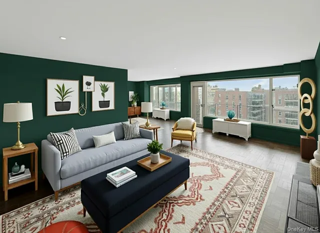 a kitchen with granite countertop kitchen island stainless steel appliances a stove a sink a microwave a refrigerator and cabinets