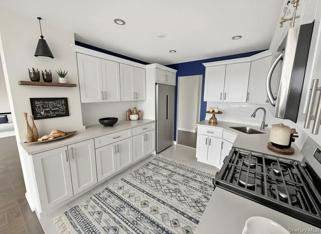 a view of a dining room with furniture and window