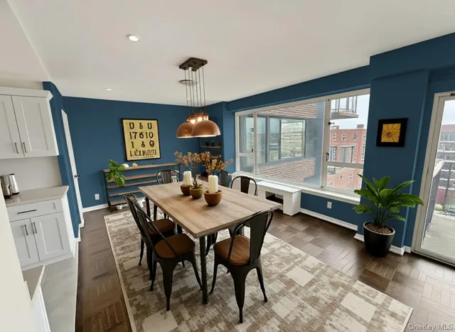 a balcony with furniture and city view