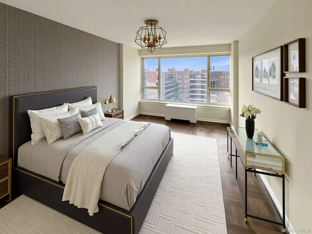 a bedroom with bed and window