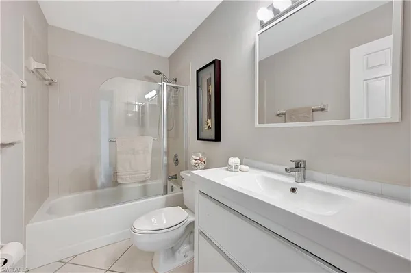 a view of storage and utility room with washer and dryer