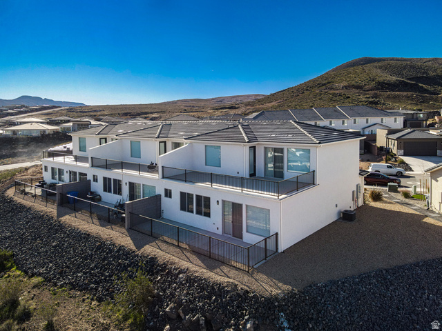 2072 W. 320 S. Hurricane, UT 84737 - Photo 2 of 46 Back View of Townhome featuring a huge upper deck and private fenced back patio all facing the amazing views!