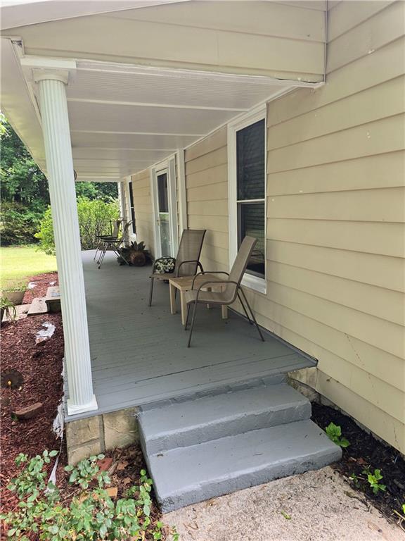2863 Maysville Road Commerce, GA 30529 - Photo 2 of 15 a view of outdoor space patio and lake view