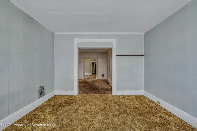 a bathroom with a sink a toilet and vanity