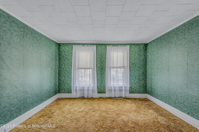 a view of a room with rack on the wall