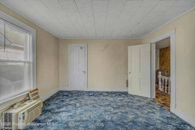 a view of storage and utility room