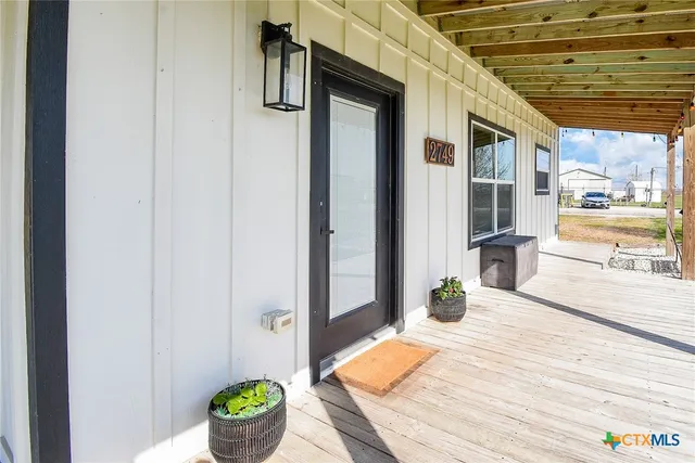 a bed room with a bed and a window