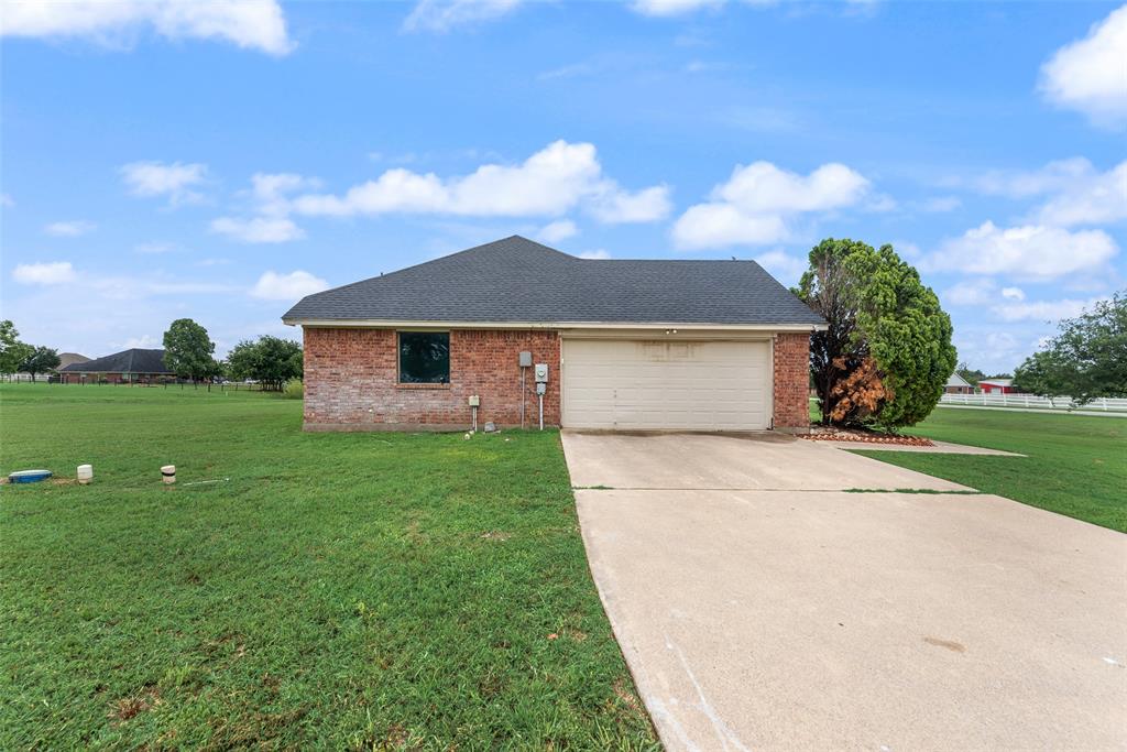 14316 Rising Spring Road Haslet, TX 76052 - Photo 25 of 31 Side entry garage