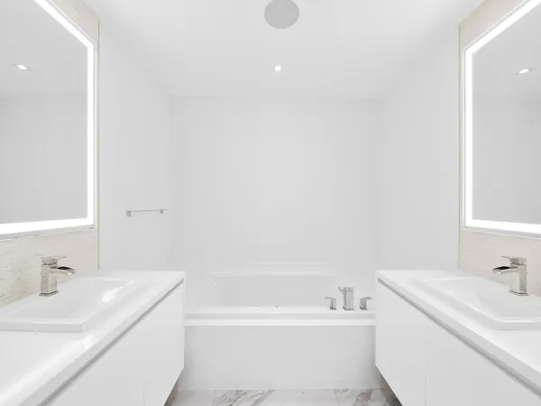 a bathroom with a sink a toilet and a bathtub