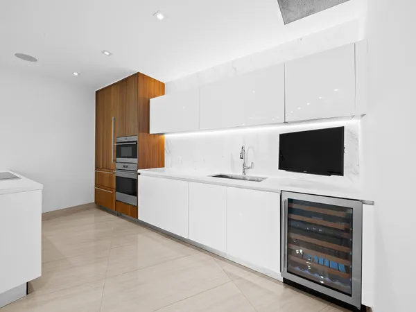 a kitchen with a cabinets and appliances