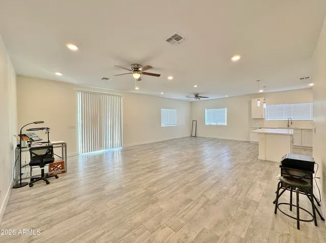 a view of a kitchen with furniture and a kitchen