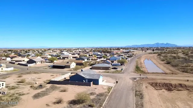 a view of ocean and a mountain