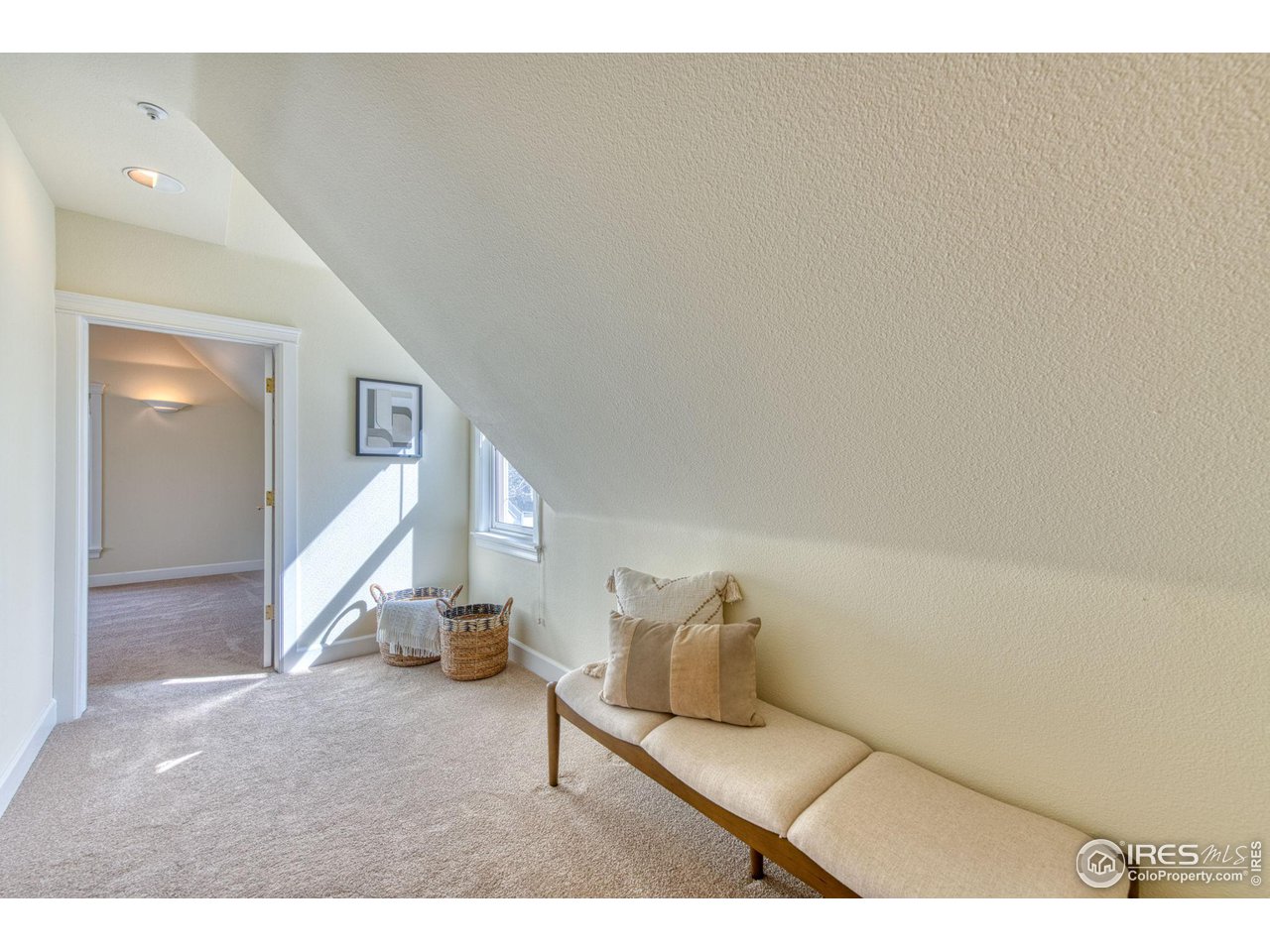 3754 26th Street Boulder, CO 80304 - Photo 24 of 34 a living room with furniture and a wooden floor
