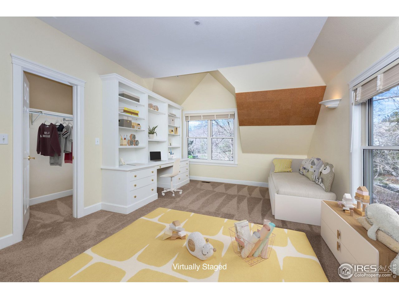 3754 26th Street Boulder, CO 80304 - Photo 26 of 34 a living room with a couch and dresser