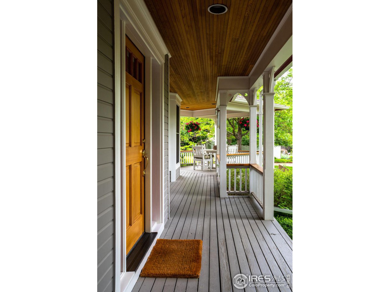 3754 26th Street Boulder, CO 80304 - Photo 3 of 34 a view of a balcony with wooden floor and outdoor space