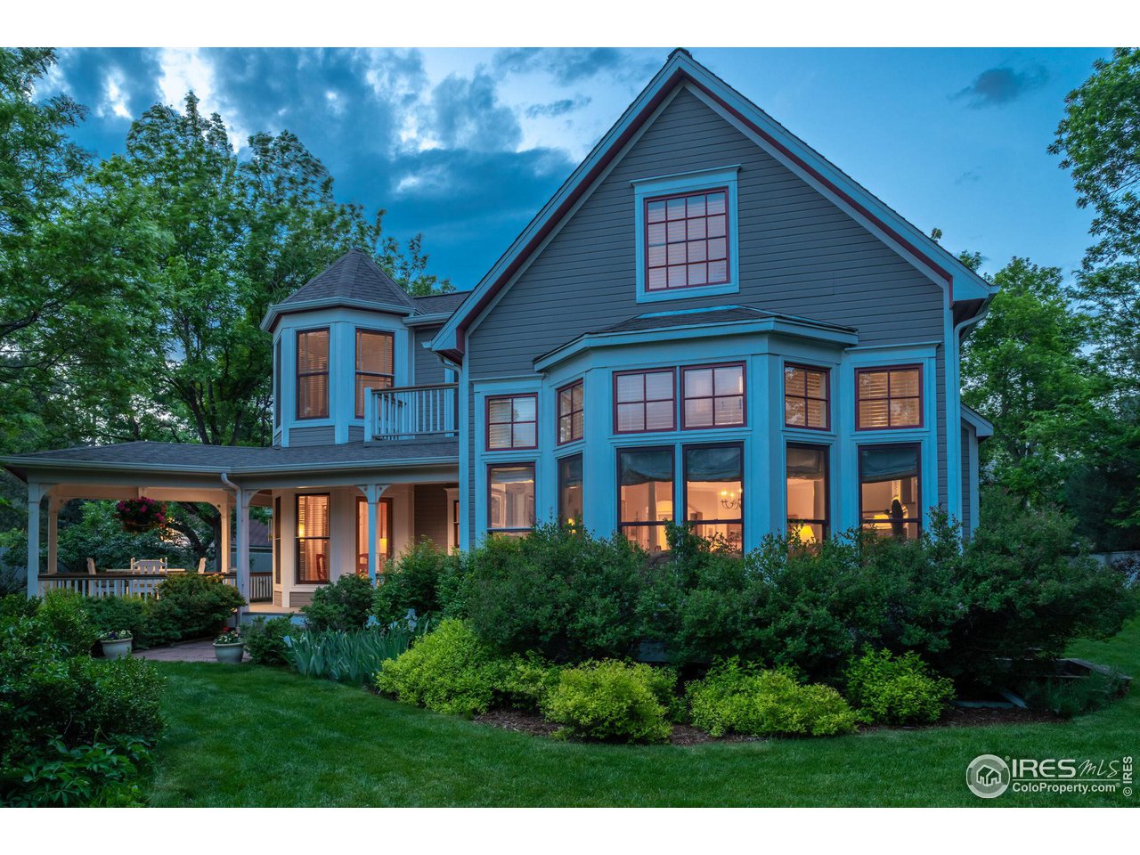 3754 26th Street Boulder, CO 80304 - Photo 32 of 34 a view of a house next to a big yard and large trees