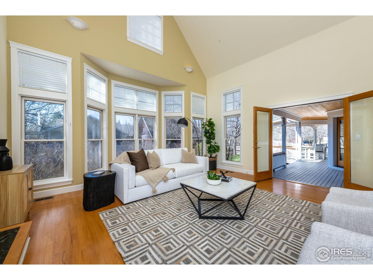 3754 26th Street Boulder, CO 80304 - Photo 9 of 34 a living room with furniture and a rug