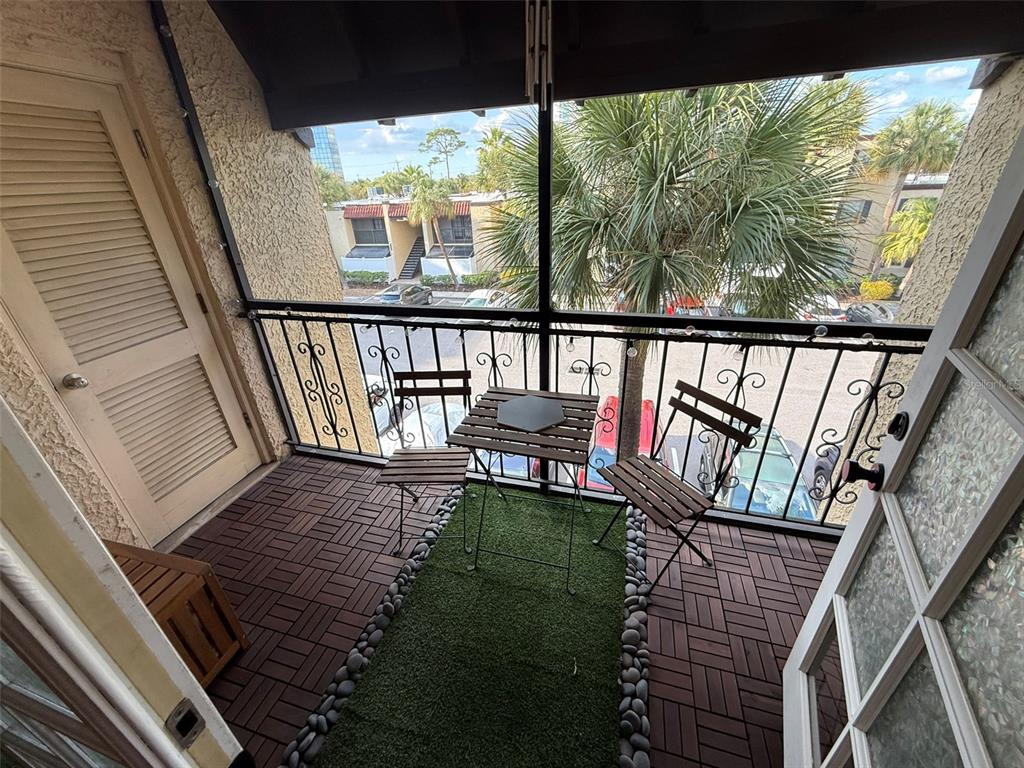5306 Santa Rosa Court, Unit 341 Tampa, FL 33609 - Photo 11 of 20 a view of a two chairs in the balcony