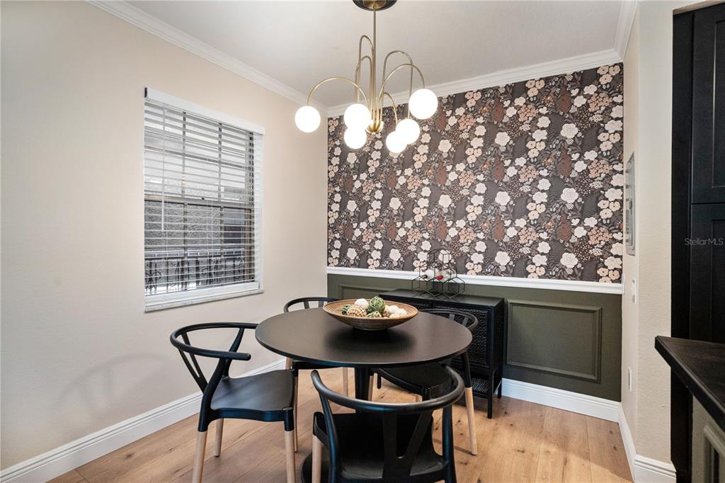 5306 Santa Rosa Court, Unit 341 Tampa, FL 33609 - Photo 7 of 20 a view of a dining room with furniture and window