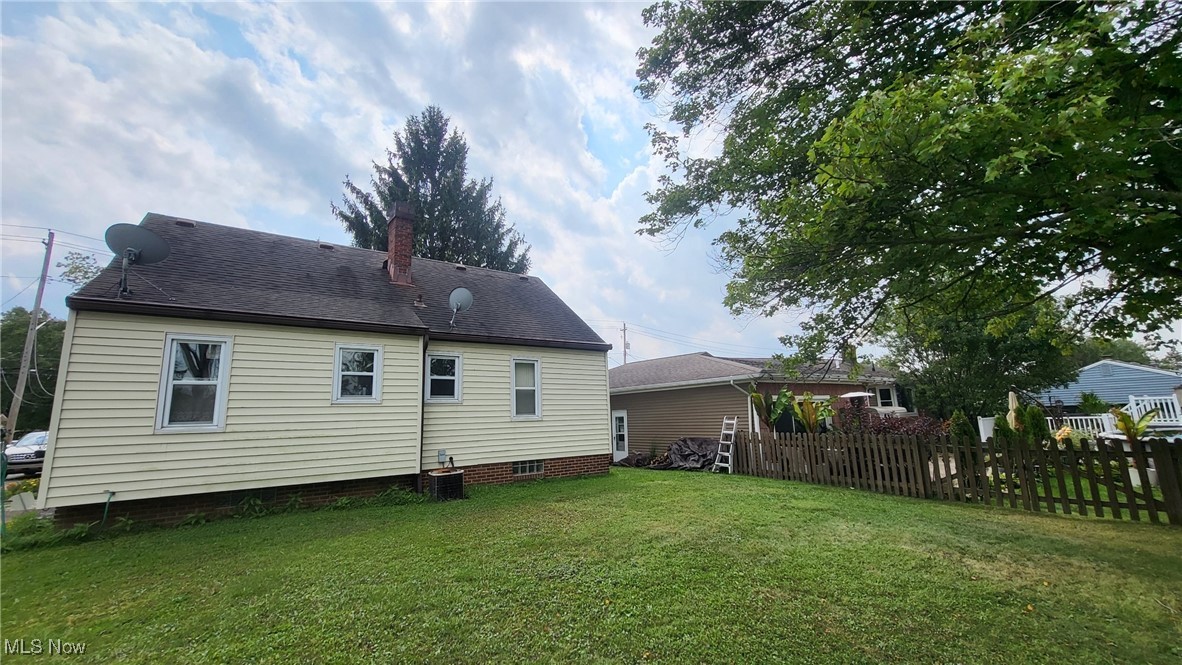11000 West Sprague Road Cleveland, OH 44130 - Photo 4 of 4 Back of property with a chimney and a shingled roof