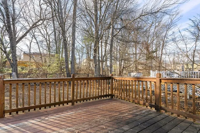 a view of wooden balcony with a swing