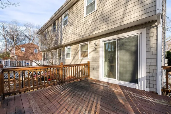 a view of a wooden balcony with wooden floor
