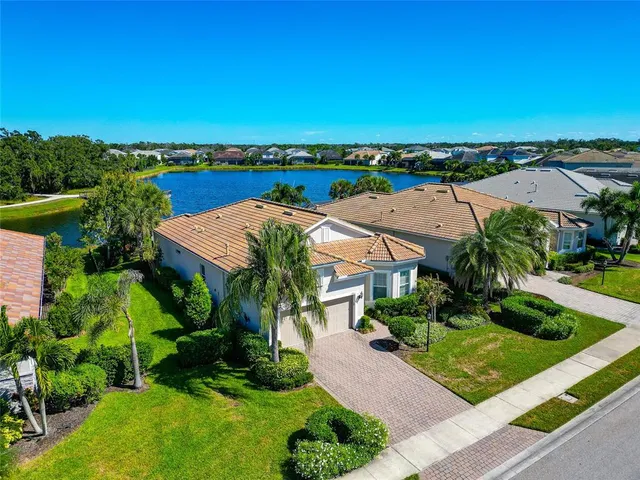 an aerial view of a house with a garden