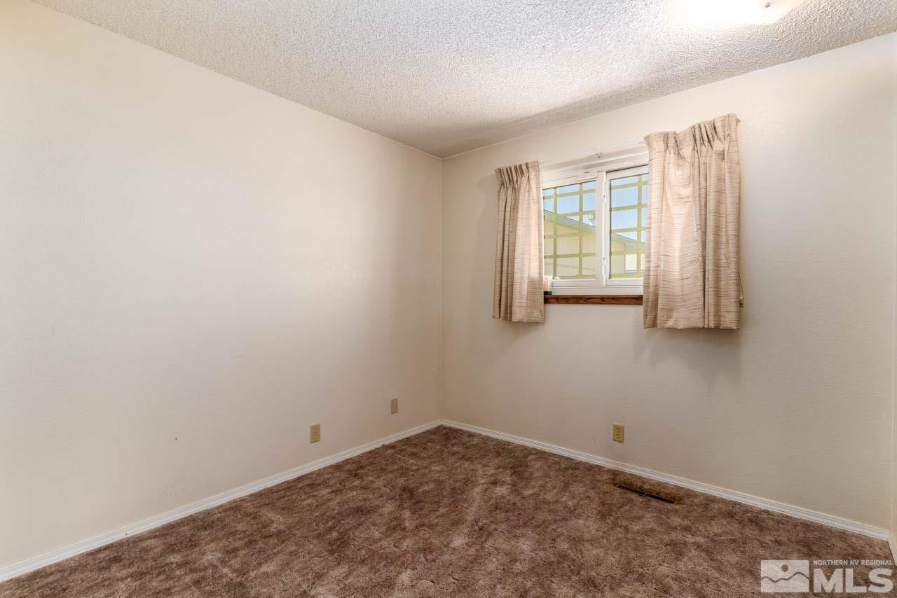 185 Ring Road Dayton, NV 89403 - Photo 17 of 29 an empty room with windows