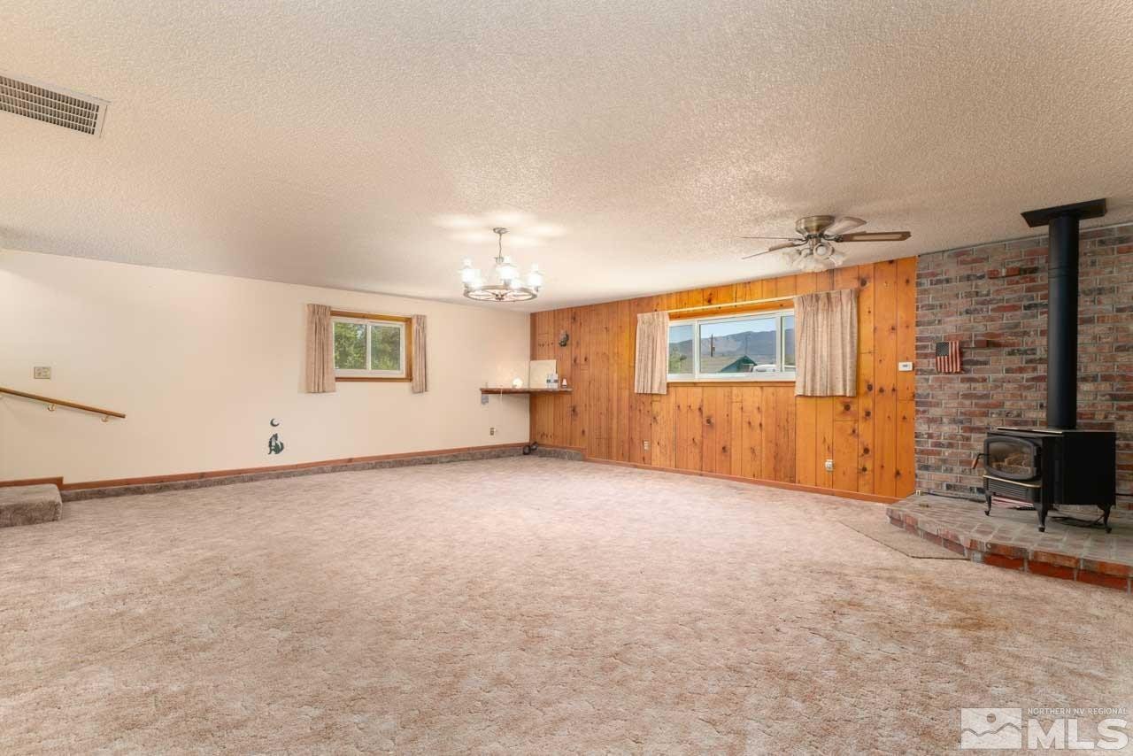 185 Ring Road Dayton, NV 89403 - Photo 4 of 29 an empty room with windows