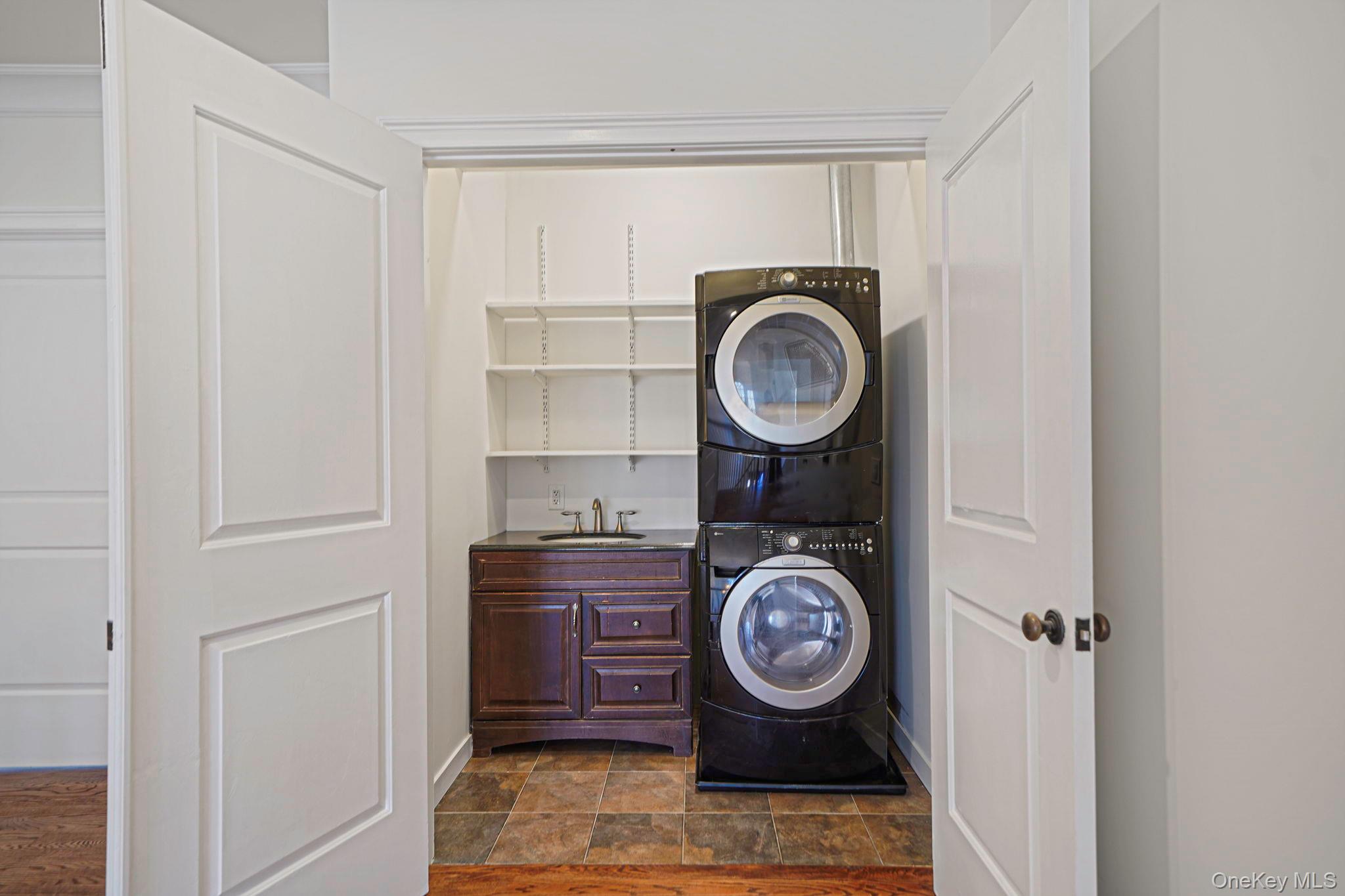 368 Main Street Setauket, NY 11733 - Photo 24 of 41 a view of washer and dryer in a utility room