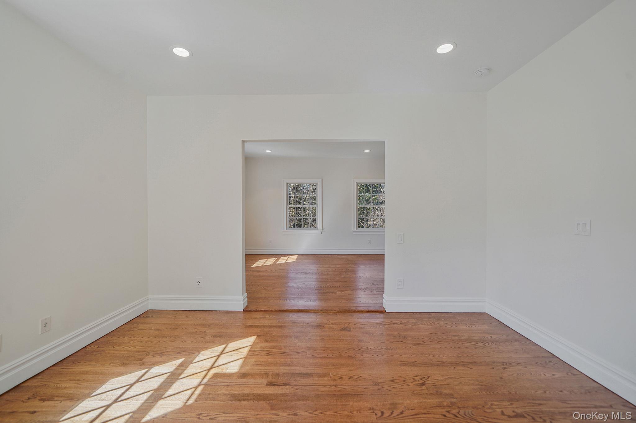 368 Main Street Setauket, NY 11733 - Photo 28 of 41 a view of hallway with wooden floor