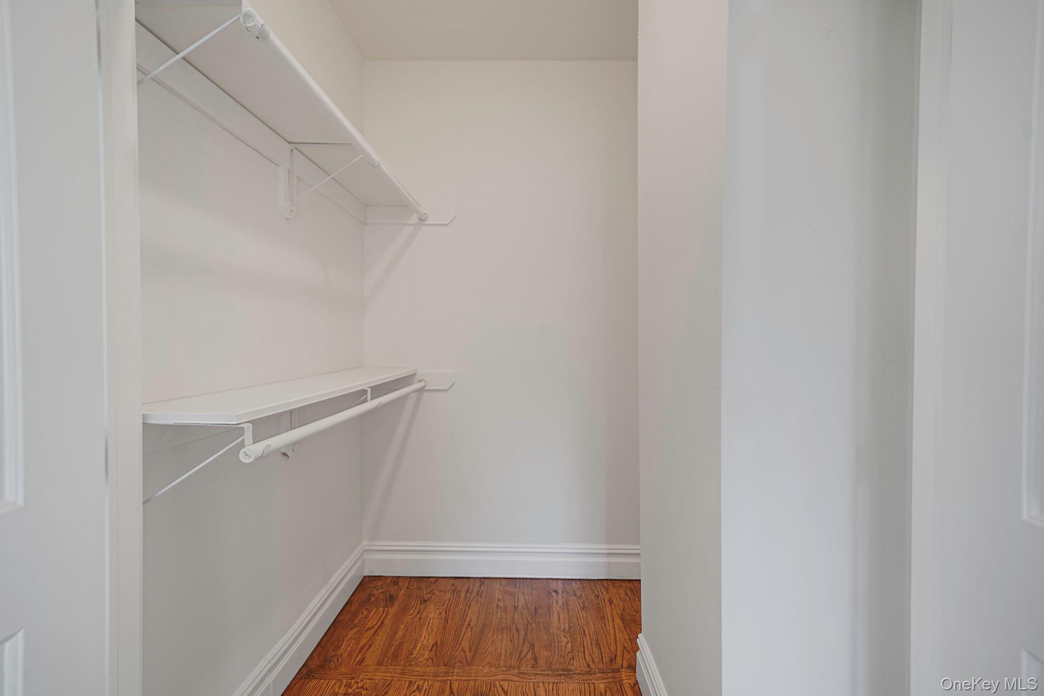 368 Main Street Setauket, NY 11733 - Photo 29 of 41 a view of walk in closet with empty racks