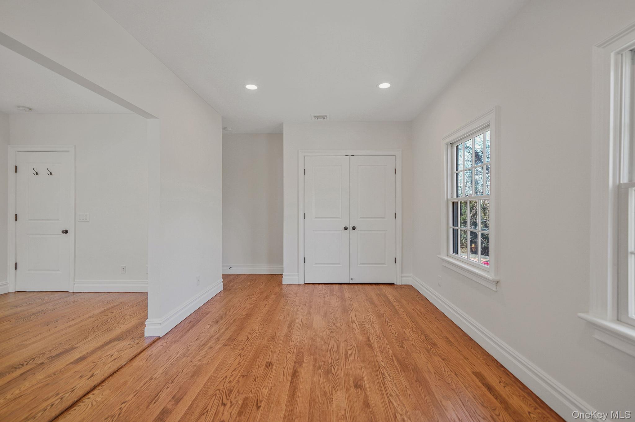 368 Main Street Setauket, NY 11733 - Photo 33 of 41 a view of empty room with wooden floor