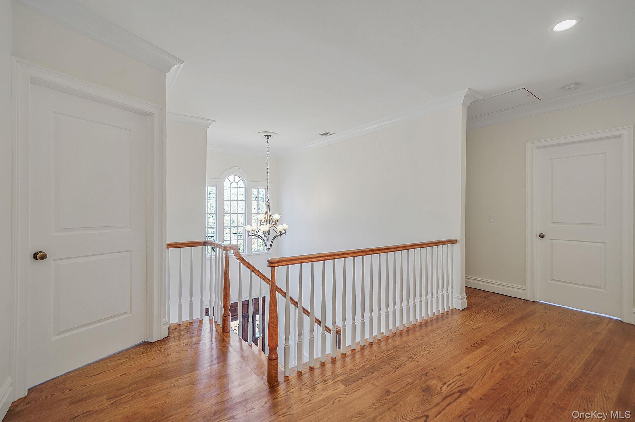 368 Main Street Setauket, NY 11733 - Photo 34 of 41 a view of entryway with wooden floor