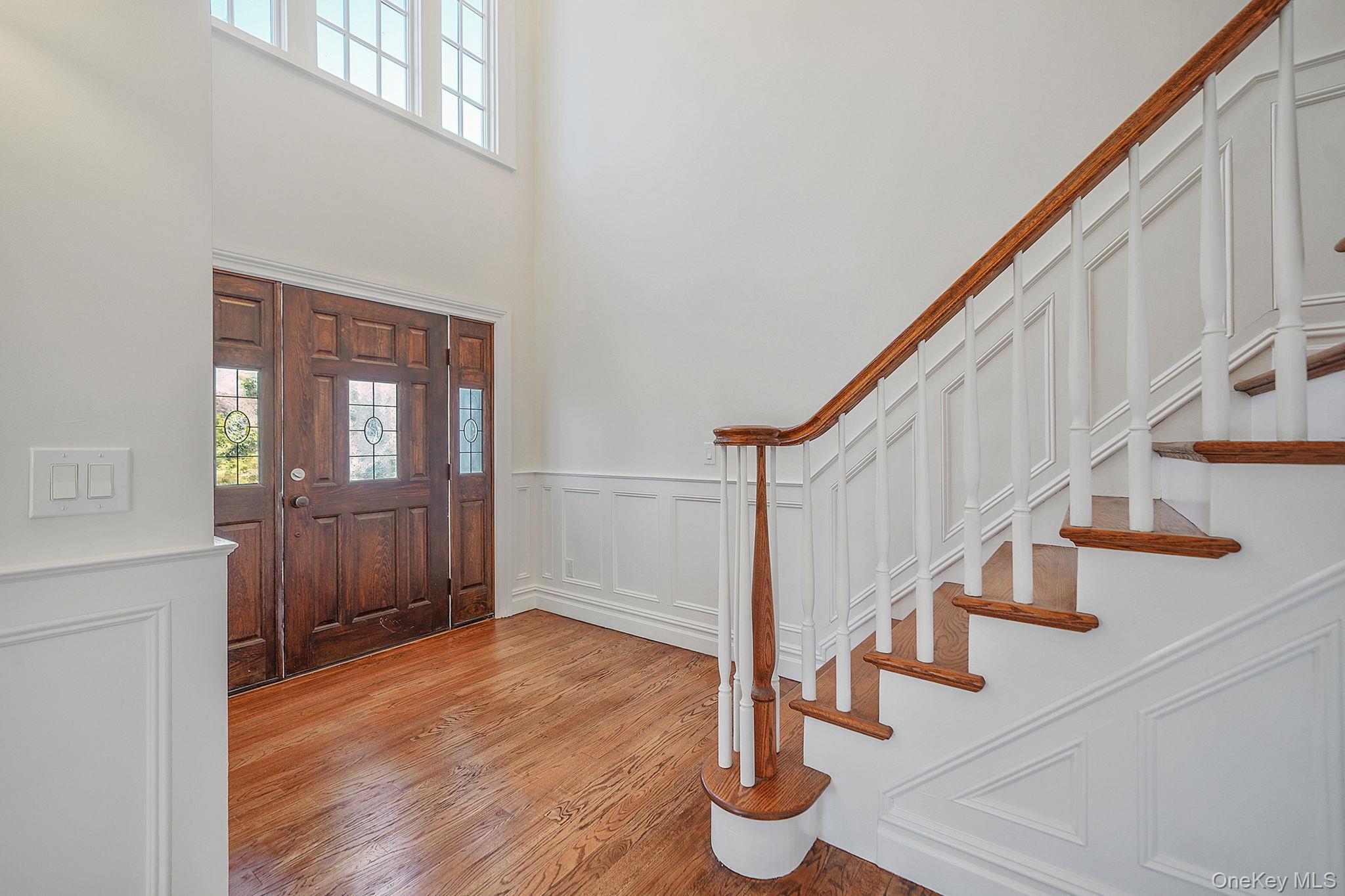 368 Main Street Setauket, NY 11733 - Photo 37 of 41 a view of entryway and hall with wooden floor
