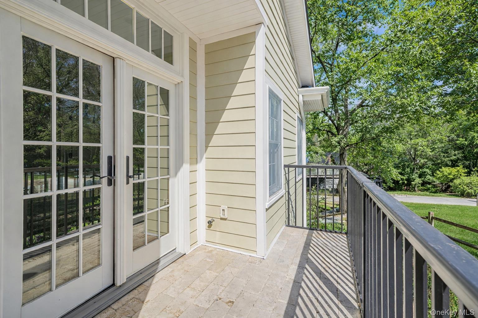 368 Main Street Setauket, NY 11733 - Photo 40 of 41 a view of balcony with wooden floor and fence
