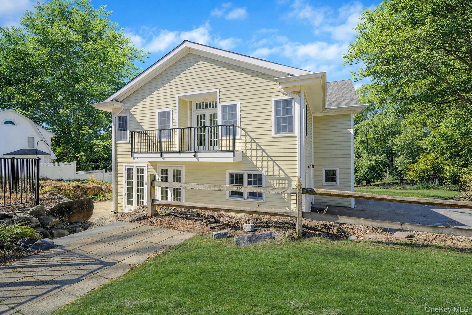 368 Main Street Setauket, NY 11733 - Photo 41 of 41 a front view of a house with a yard