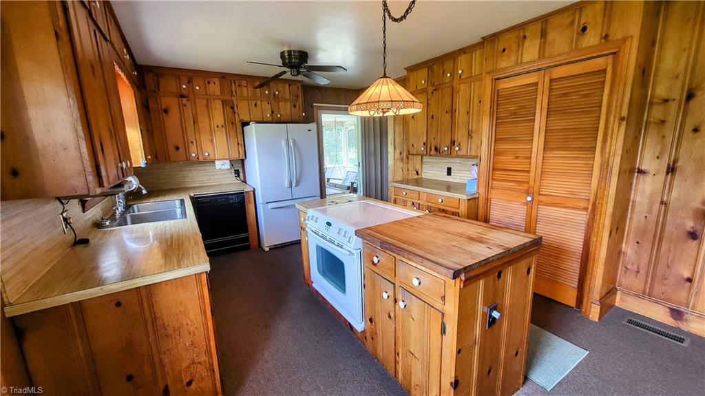 310 Sedge Garden Road Kernersville, NC 27284 - Photo 5 of 34 Charming kitchen with pantry!