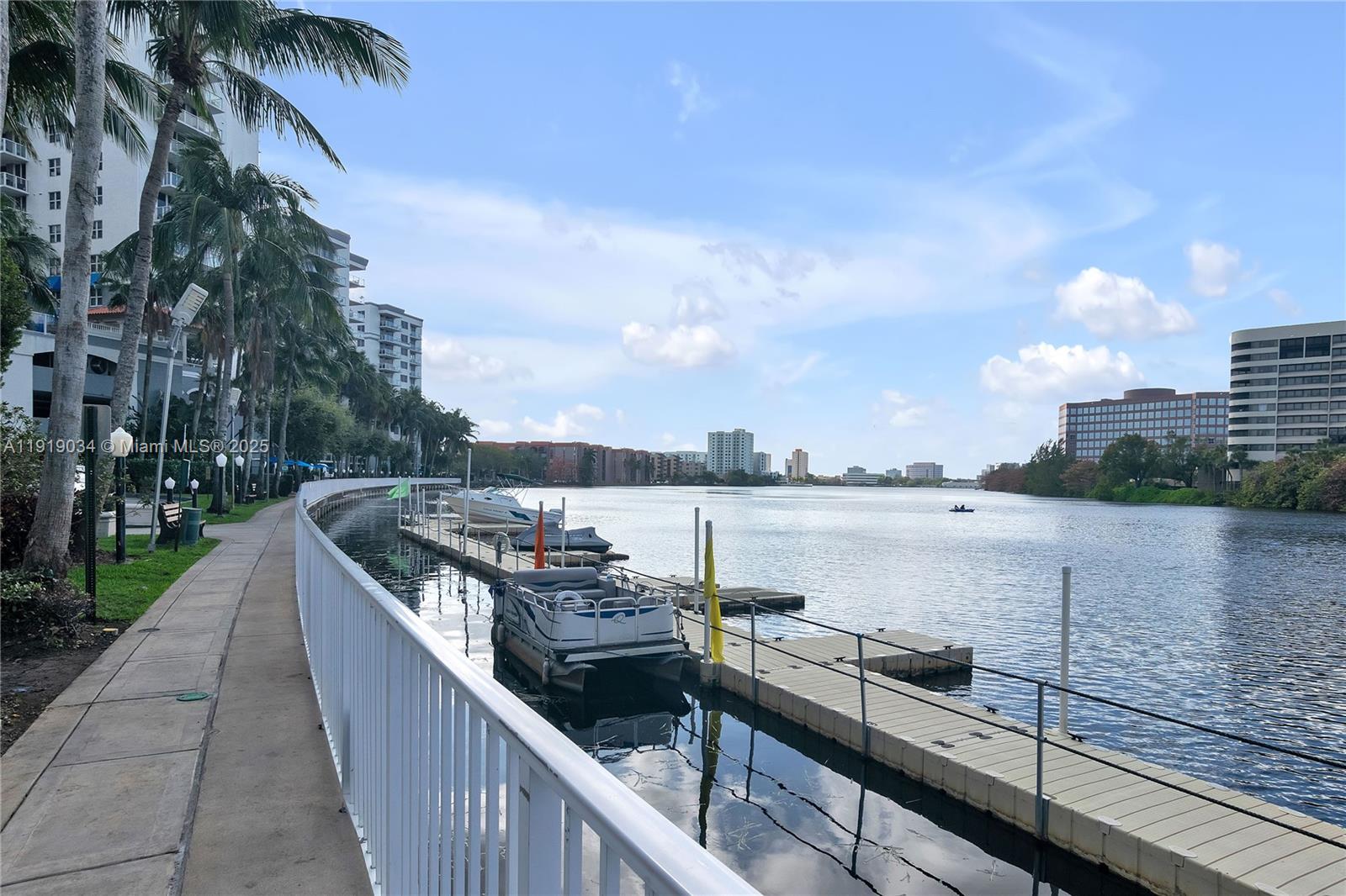 5077 Northwest 7th Street, Unit 610 Miami, FL 33126 - Photo 12 of 20 a view of a lake with a terrace