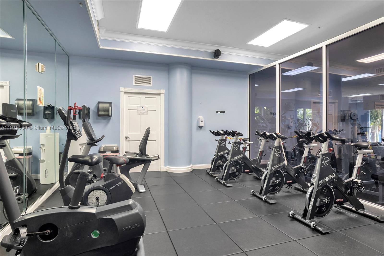 5077 Northwest 7th Street, Unit 610 Miami, FL 33126 - Photo 17 of 20 a view of a room with gym equipment