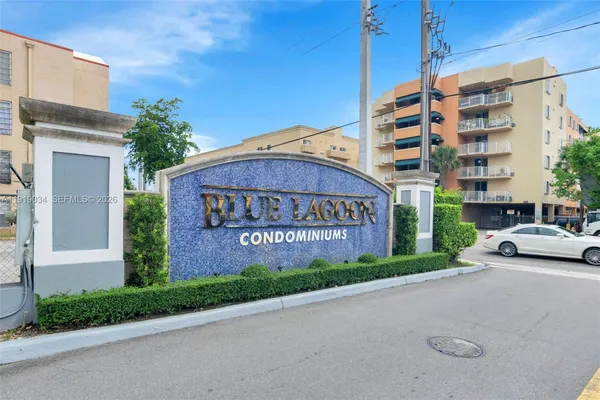 a view of a city with a lake