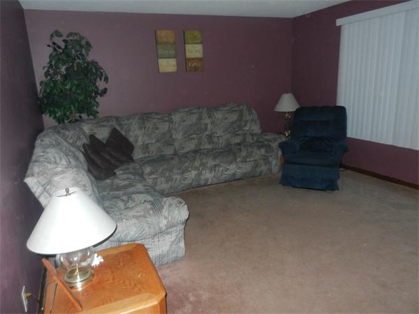 82 Crocker Nye Road Oakham, MA 01068 - Photo 3 of 7 a living room with furniture flowerpot and wooden floor