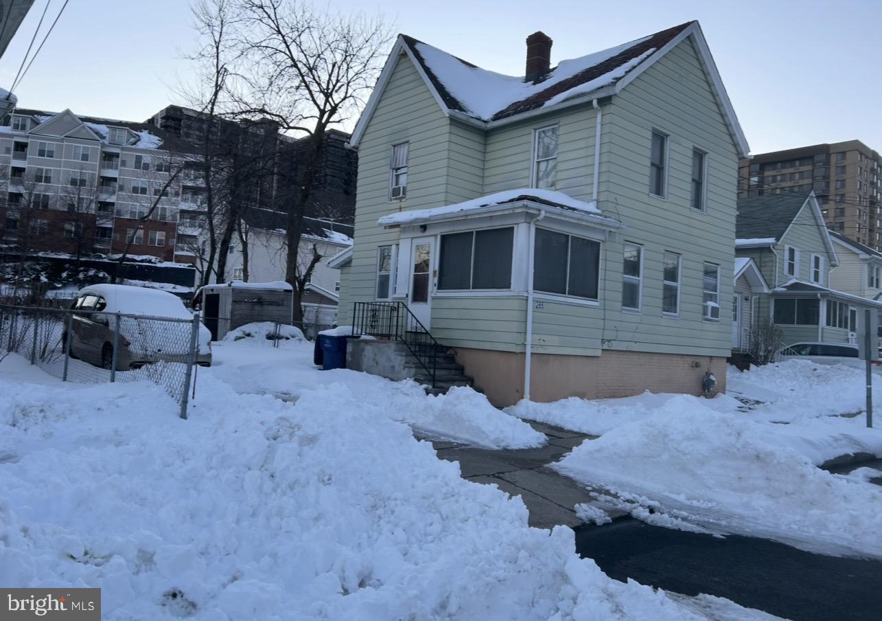 285 Berry Street Hackensack, NJ 07601 - Photo 1 of 1 a front view of a house with a yard