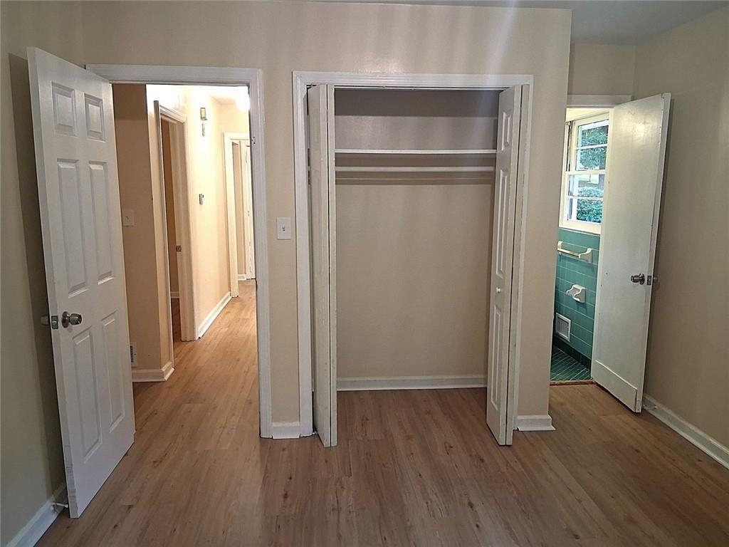 1915 Wee Kirk Road Southeast Atlanta, GA 30316 - Photo 13 of 23 a view of a livingroom with wooden floor