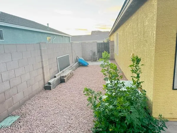 a view of a house with a parking space