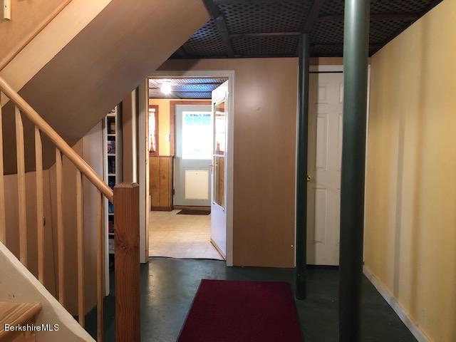 125 Middlefield Road Peru, MA 01235 - Photo 19 of 45 a view of entryway and hall with wooden floor