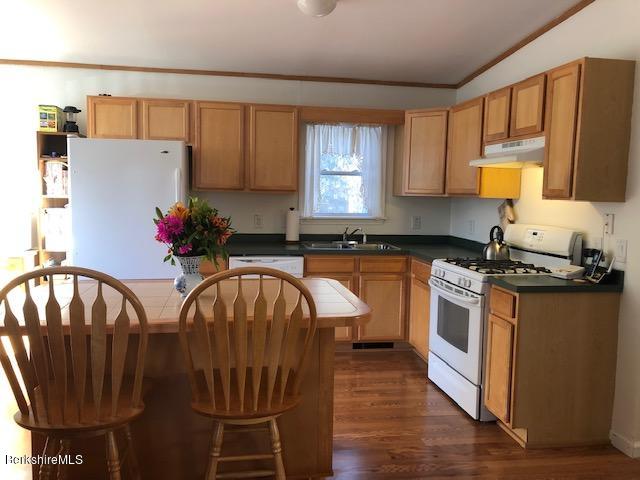 125 Middlefield Road Peru, MA 01235 - Photo 3 of 45 a kitchen with stainless steel appliances granite countertop a stove a sink dishwasher and a refrigerator