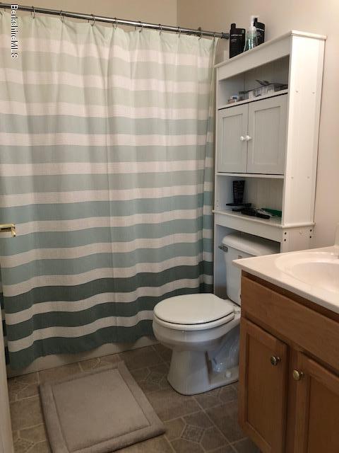 125 Middlefield Road Peru, MA 01235 - Photo 22 of 45 a bathroom with a sink toilet and shower