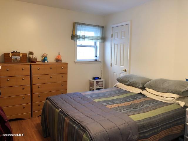 125 Middlefield Road Peru, MA 01235 - Photo 26 of 45 a bedroom with a bed and a window