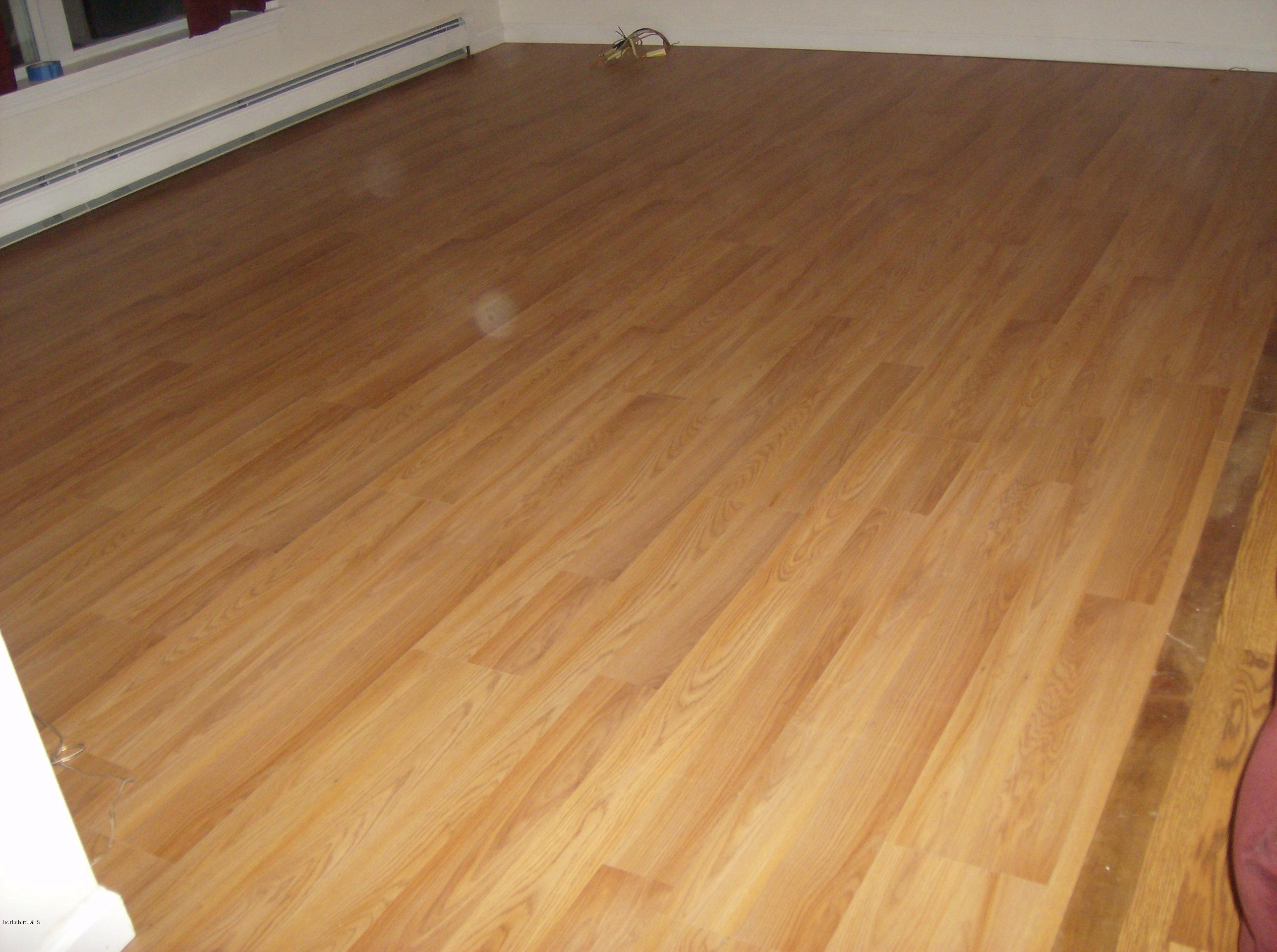125 Middlefield Road Peru, MA 01235 - Photo 40 of 45 a view of a big room with wooden floor